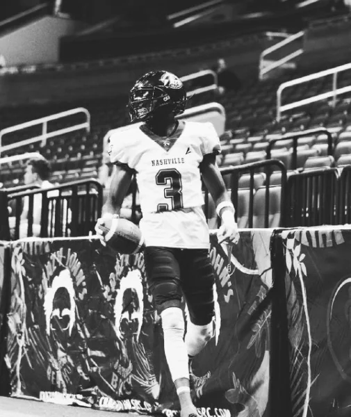Carrington Thompson walks beside the field in his Nashville uniform